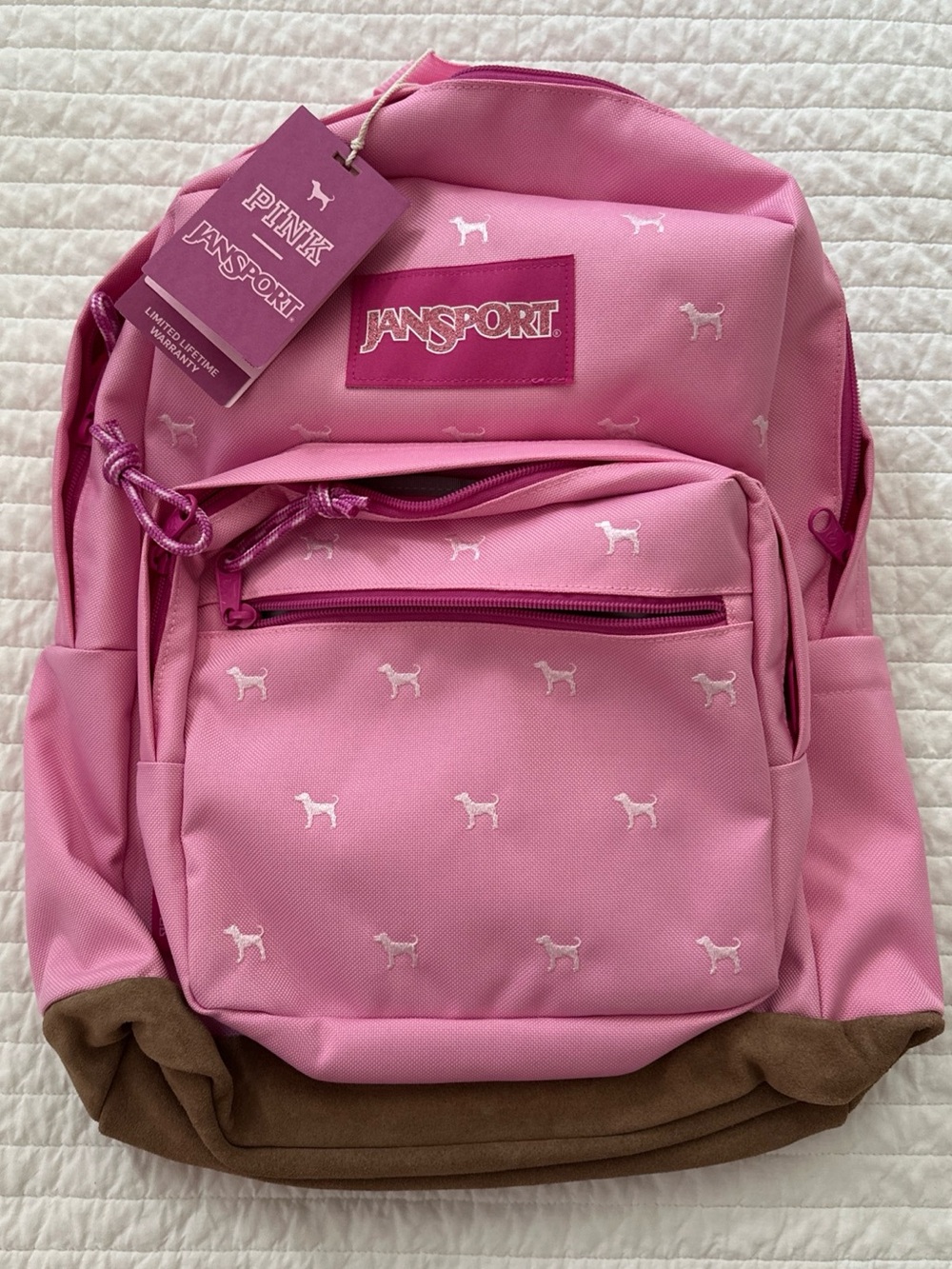 Jansport Pink Victoria’s Secret Backpack with White Dog Print and leather Base